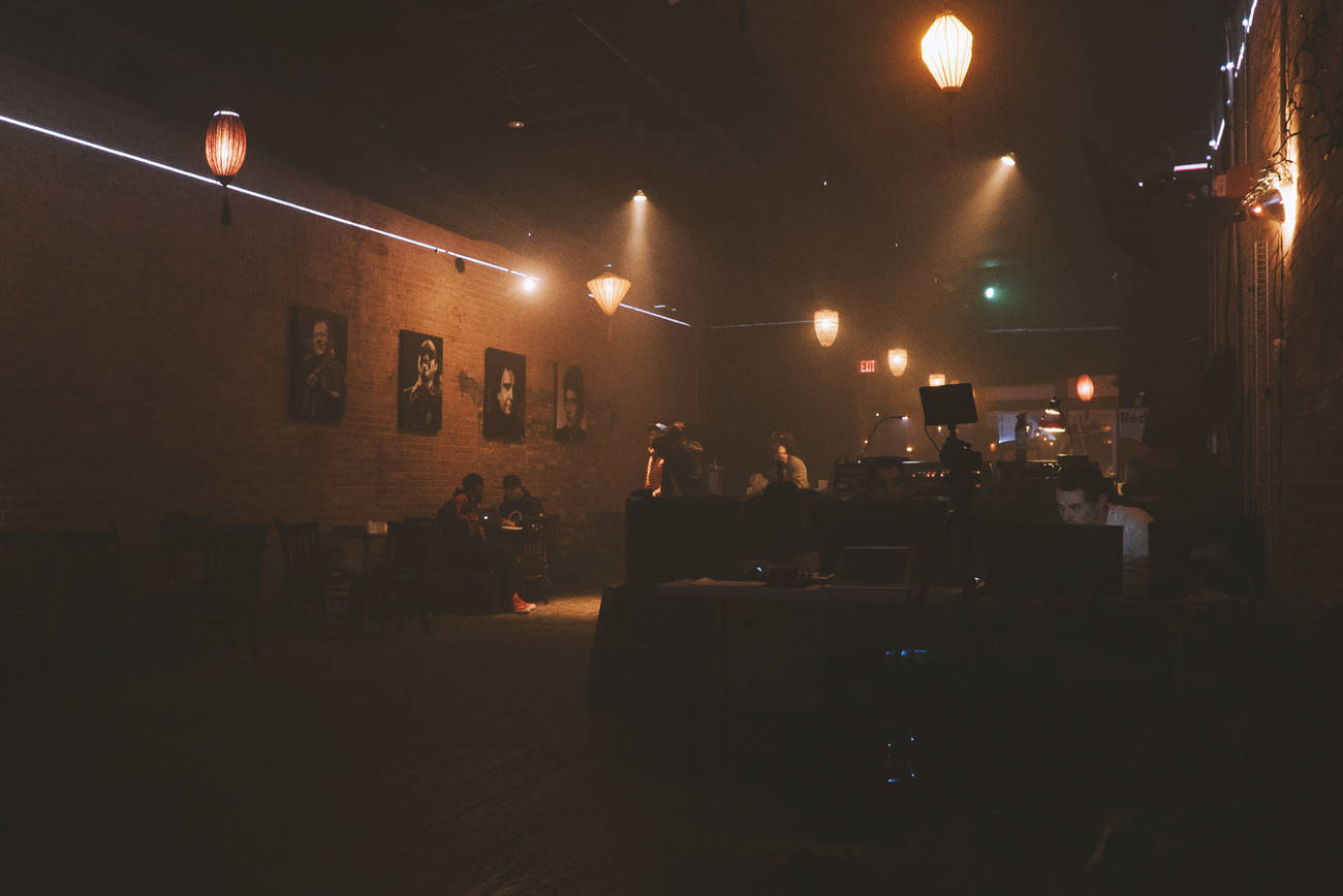 a shot of the venue, filled with haze, and house lights low. Deep Ellum