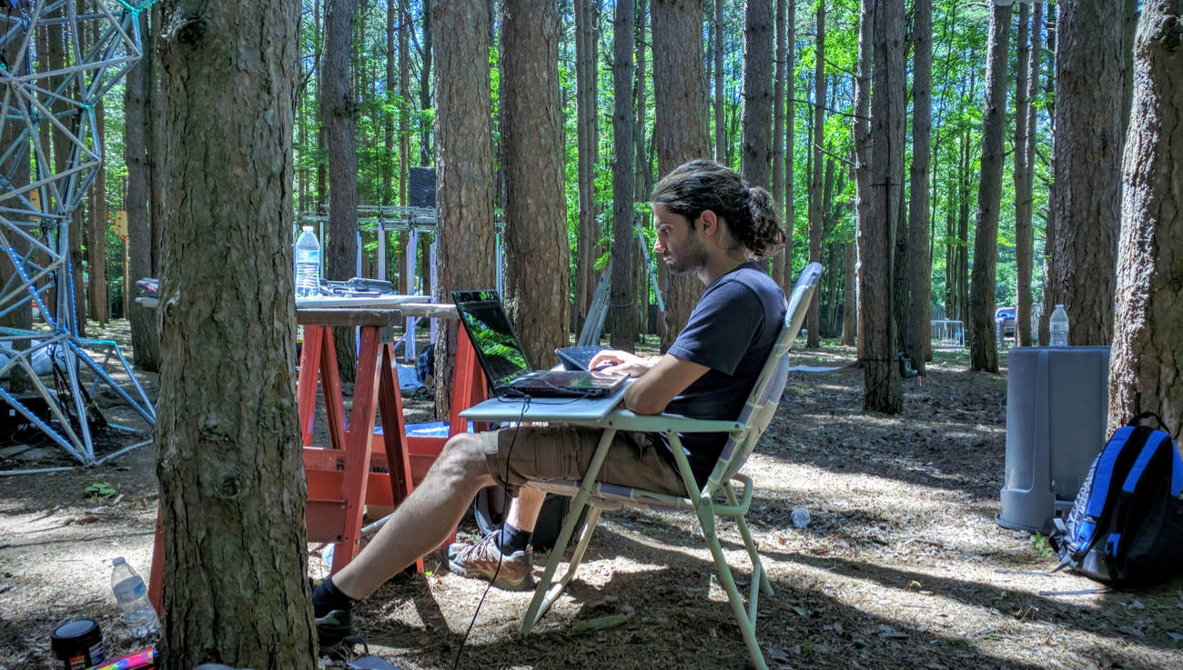 Lucas Morgan programming in folding chair